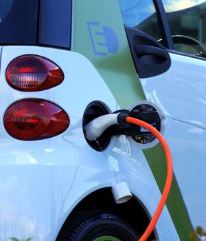 What is opening EV charging stations to cyberattacks?